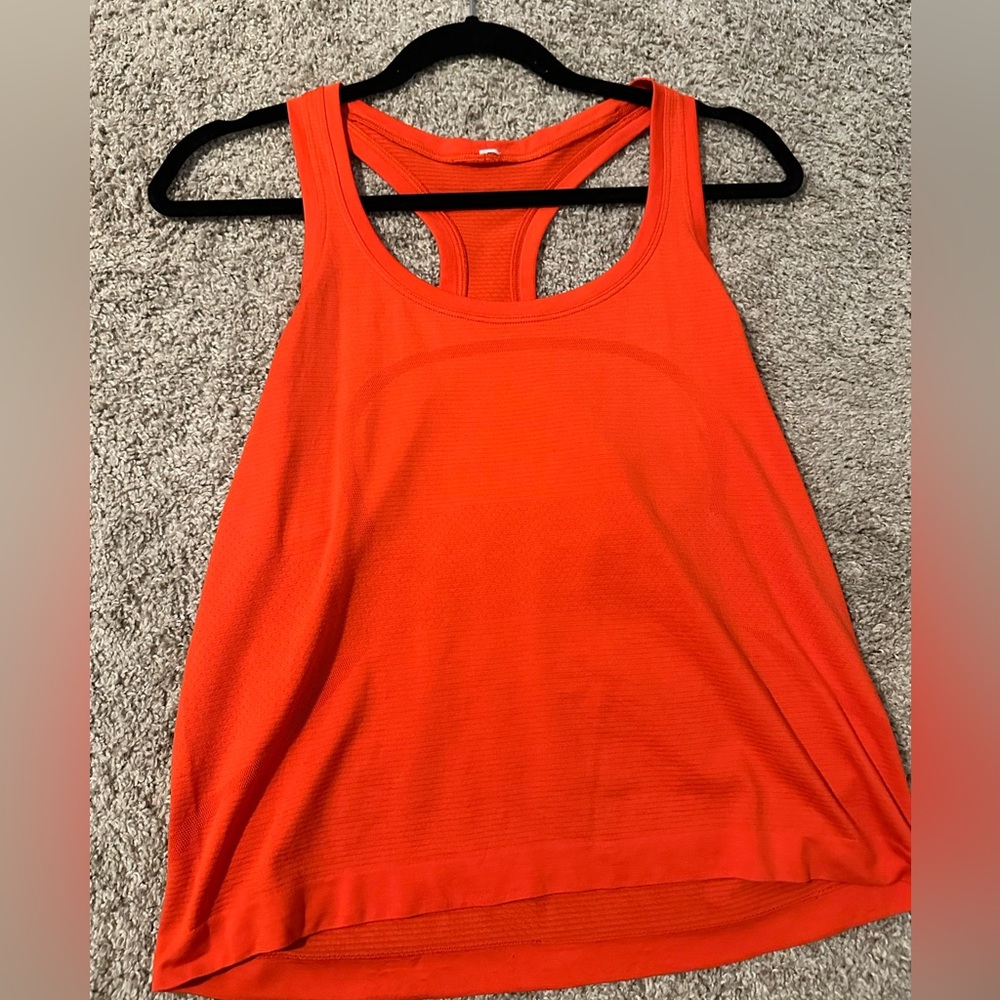 Orange cropped Lululemon tank